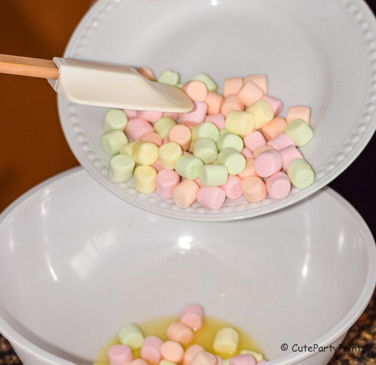 Add the colorful marshmallows to melted butter